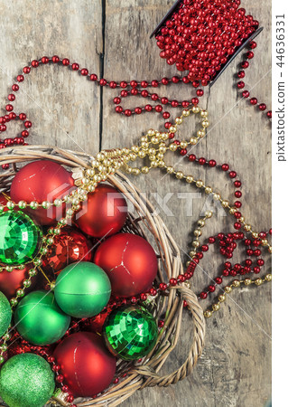 Christmas balls red, gold, green, beads lie in Christmas balls red, gold, green, beads lie in 44636331