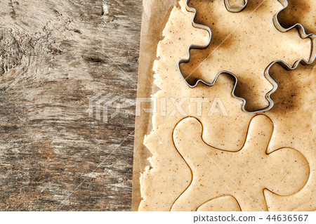 Roll out the dough cut out Christmas shapes Roll out the dough cut out Christmas shapes 44636567