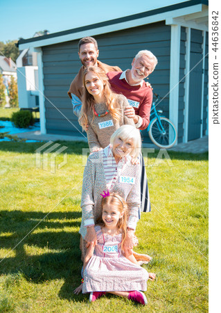 Handsome young man standing at the end of line Handsome young man standing at the end of line 44636842