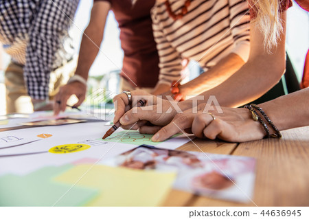 Close up of female hand that drawing picture Close up of female hand that drawing picture 44636945