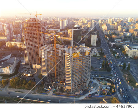 High tower building construction site. Bug industrial crane. Aerial drone view. Metropolis city 44637903