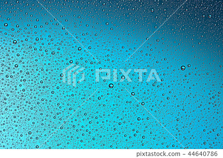fresh drops background blue glass / wet rainy background, water drops transparent glass blue 44640786