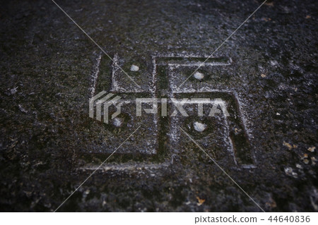 Buddhist religious symbols inscriptions in Tibet old runes 44640836