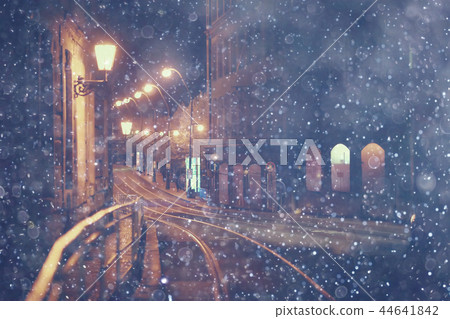 snow transport road city / landscape in a night city in winter, cars on the road in traffic jam in cold weather, snow 44641842