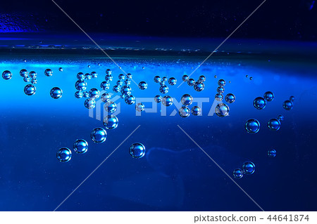 air bubbles in water macro background / blue background abstract bubbles in water 44641874