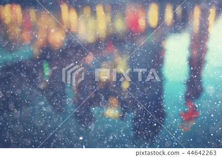 snow in a night city skyscrapers / seasonal landscape winter city, snowfall against a background of skyscrapers 44642263