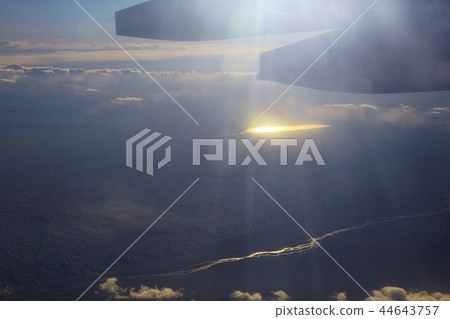 sunset clouds view from the airplane 44643757