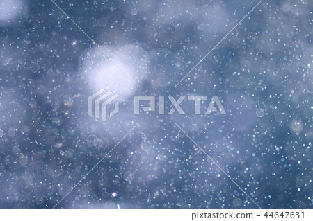 city lights snow glow background blurred / cityscape blurred bokeh, snowy weather seasonal background winter December 44647631