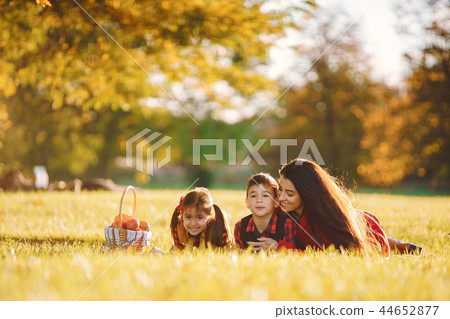 Beautiful mother with little kids Beautiful mother with little kids 44652877
