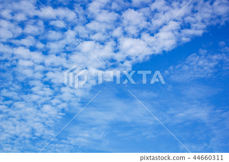 Clouds in the blue sky. 44660311