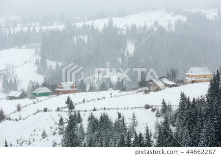 Early morning winter mountain village landscape 44662287