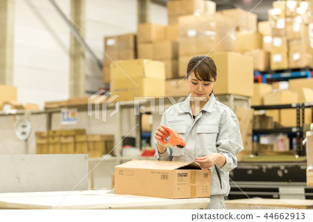 Logistics Warehouse Working people Packaging work 44662913