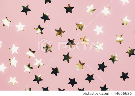 Golden stars on pink background Golden stars on pink background 44666626