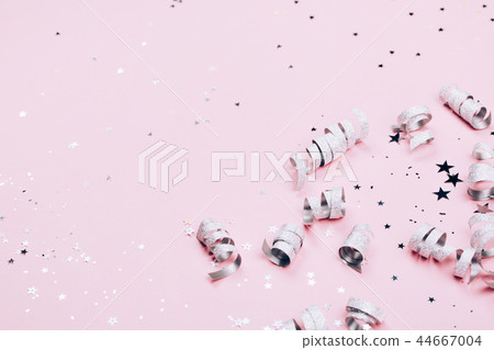 Silver sparkles on pink background 44667004