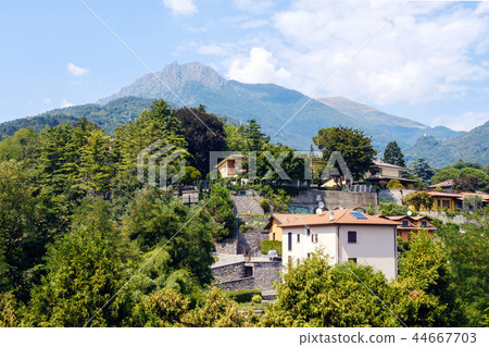 Menaggio town with mountains Menaggio town with mountains 44667703