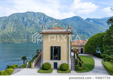 A part of Villa Balbianello with mountains A part of Villa Balbianello with mountains 44667730