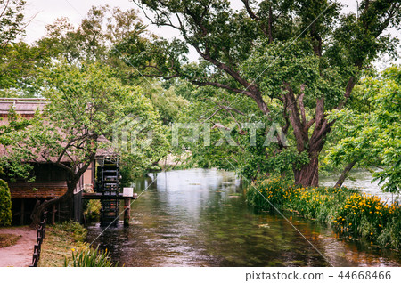 Natural stream vintage cottage old water turbine Natural stream vintage cottage old water turbine 44668466