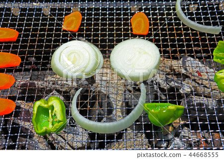 Try drawing faces with BBQ vegetables 44668555