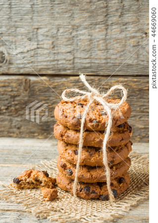 Homemade cookies with chocolate thread tied Homemade cookies with chocolate thread tied 44669060