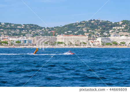Parasailing ship on water 44669809