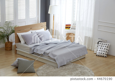 Warm sunny bedroom 44670190