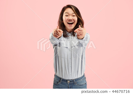 The happy business woman point you and want you, half length closeup portrait on pink background. The happy business woman point you and want you, half length closeup portrait on pink background. 44670716