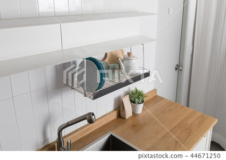 Image of dishwasher with kitchen utensils, kitchen with white background 44671250