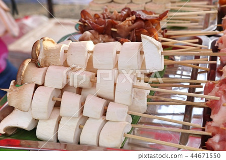 Grilled mushrooms at street food Grilled mushrooms at street food 44671550