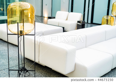 Office waiting area interior with white sofas 44673150