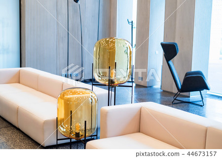 Office waiting area interior with white sofas 44673157