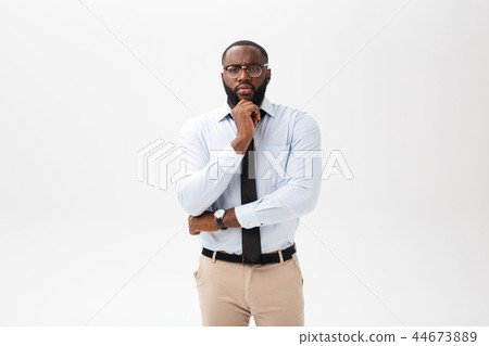 business man African American with glasses thinks on isolated white background business man African American with glasses thinks on isolated white background 44673889