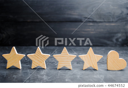 four stars and heart on a black background. 44674552