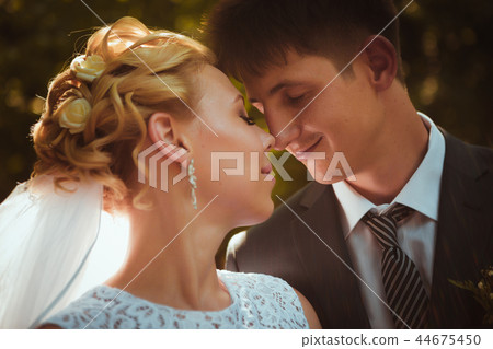 portrait of the bride and groom on the background 44675450