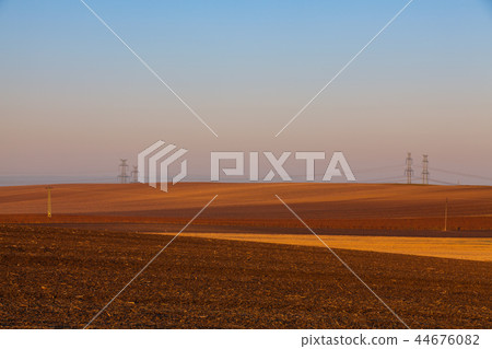 Autumn landscape with agricultural land 44676082