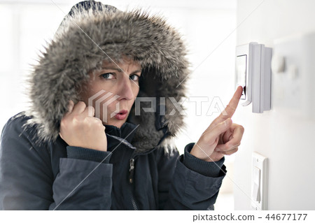 Woman With Warm Clothing Feeling The Cold Inside House Woman With Warm Clothing Feeling The Cold Inside House 44677177