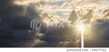 Wind generator on a background of sunset sky 44677382