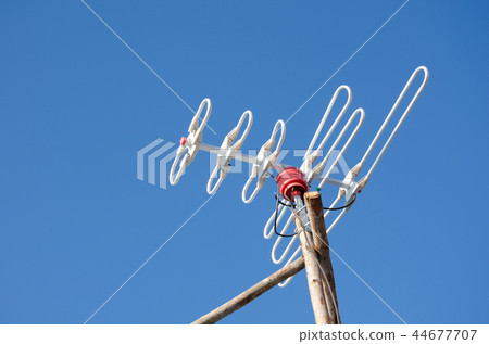 Old-fashioned radio antenna receiver set in rural Old-fashioned radio antenna receiver set in rural 44677707
