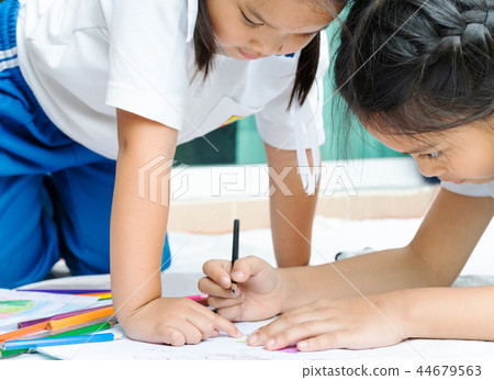 two sister girl writes to writing-books lessons 44679563