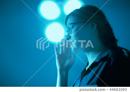 girl checking eyesight glasses / young adult girl wearing glasses 44681093