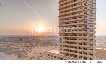 Sunset in Ajman from rooftop timelapse. Ajman is the capital of the emirate of Ajman in the United Arab Emirates. Sunset in Ajman from rooftop timelapse. Ajman is the capital of the emirate of Ajman in the United Arab Emirates. 44681662