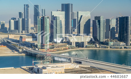 Aerial skyline of Abu Dhabi city centre from above timelapse Aerial skyline of Abu Dhabi city centre from above timelapse 44681687