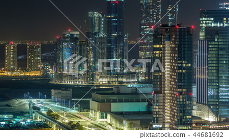 Aerial skyline of Abu Dhabi city centre from above night timelapse Aerial skyline of Abu Dhabi city centre from above night timelapse 44681692