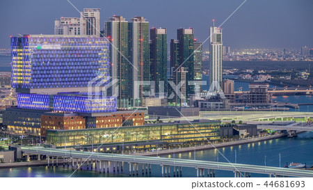 Aerial skyline of Abu Dhabi city centre from above day to night timelapse Aerial skyline of Abu Dhabi city centre from above day to night timelapse 44681693