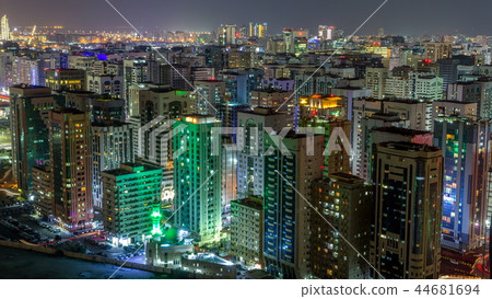 Aerial skyline of Abu Dhabi city centre from above night timelapse Aerial skyline of Abu Dhabi city centre from above night timelapse 44681694