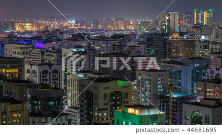 Aerial skyline of Abu Dhabi city centre from above night timelapse Aerial skyline of Abu Dhabi city centre from above night timelapse 44681695