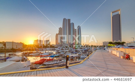 Al Bateen marina Abu Dhabi timelapse with modern skyscrapers on background Al Bateen marina Abu Dhabi timelapse with modern skyscrapers on background 44681697