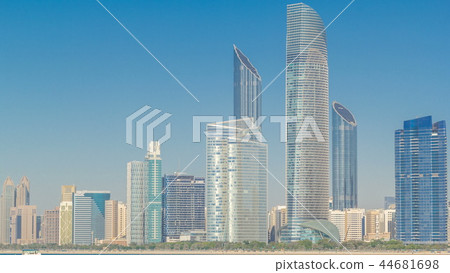 View of high skyscrapers on a corniche in Abu Dhabi stretching alongside the business center timelapse hyperlapse. View of high skyscrapers on a corniche in Abu Dhabi stretching alongside the business center timelapse hyperlapse. 44681698