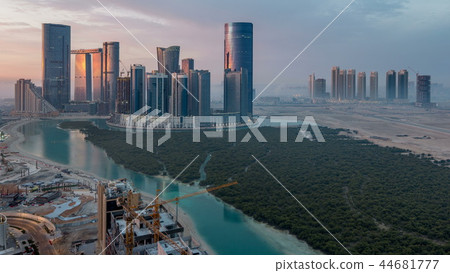 Buildings on Al Reem island in Abu Dhabi timelapse from above. Buildings on Al Reem island in Abu Dhabi timelapse from above. 44681777
