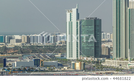 Buildings on Al Reem island in Abu Dhabi timelapse from above. 44681822