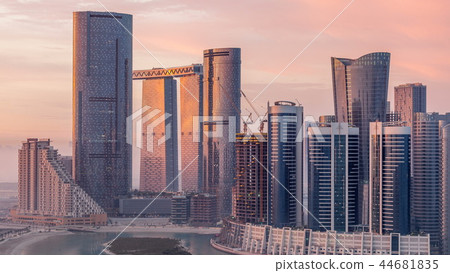 Buildings on Al Reem island in Abu Dhabi timelapse from above. Buildings on Al Reem island in Abu Dhabi timelapse from above. 44681835
